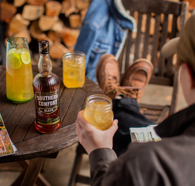 Man holding mason jar with Southern Lemonade